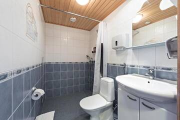 Фото номера Стандартный двухместный номер с 2 отдельными кроватями Отель Hotel Lokkilinna г. Калайоки 7