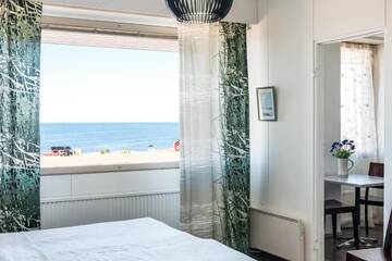 Фото номера Семейный номер с видом на море Отель Hotel Rantakalla г. Калайоки 10